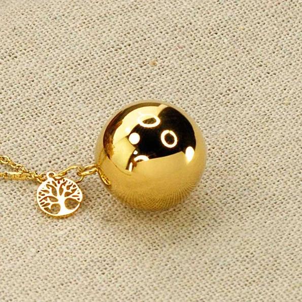 bola de grossesse avec un arbre de vie en pendentif