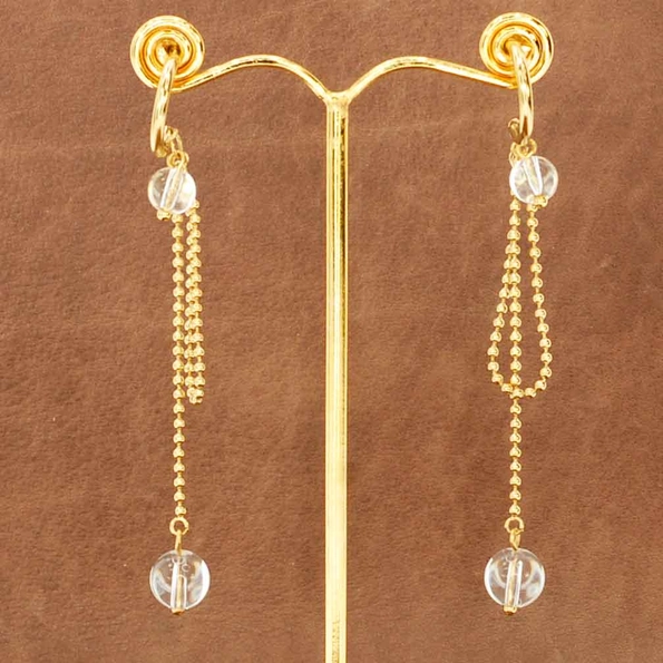 Boucles d'oreilles pendante avec boule de cristal