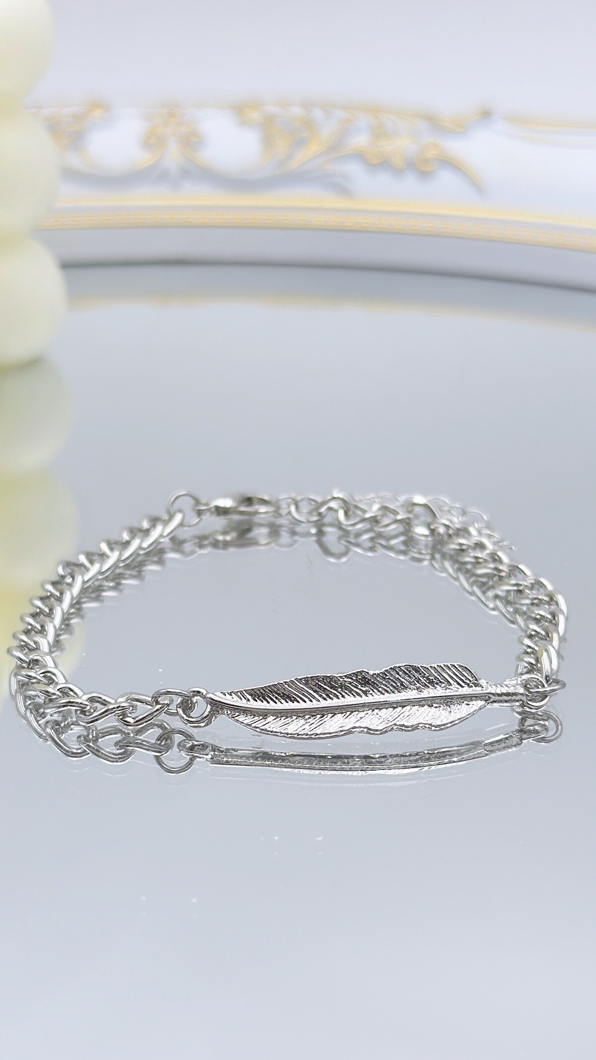 bracelet plume en acier inoxydable