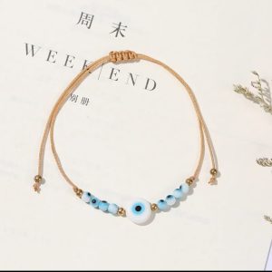 bracelet avec oeil porte bonheur et cordon ajustable