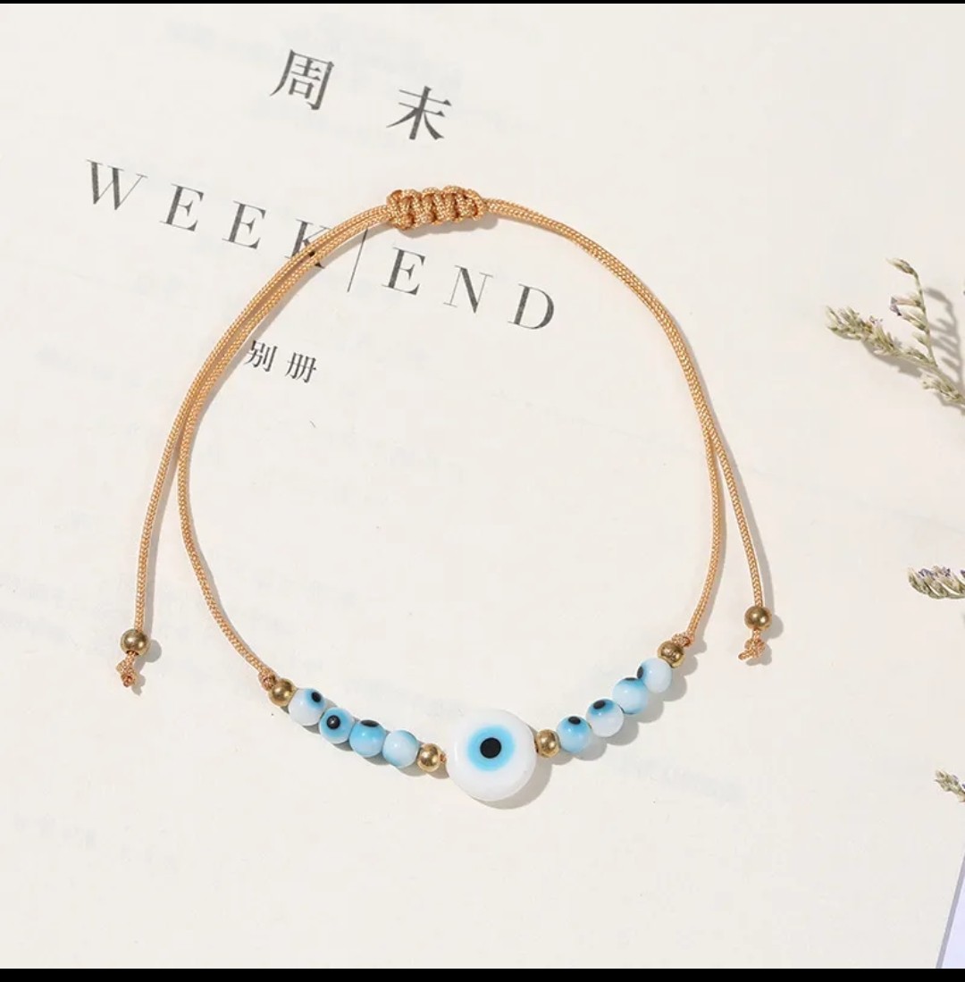 bracelet avec oeil porte bonheur et cordon ajustable